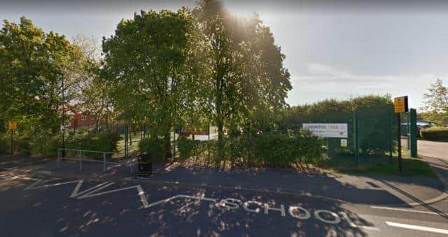 Norton Free Church of England Primary has joined 20 local residents in opposing apartment plans