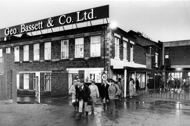 Workers leave the factory at the end of a shift at George Bassett & Co in 1989