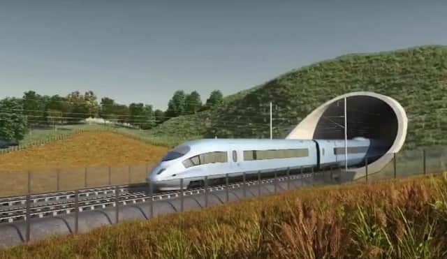An artist's impression of the HS2 line which is set to be officially axed today.