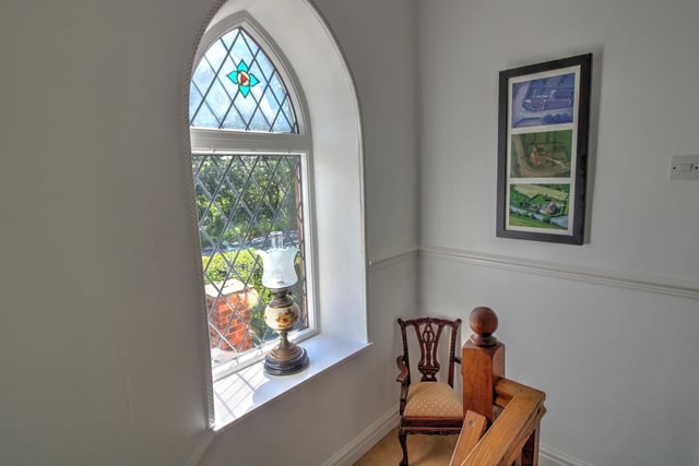 With an arched double glazed window to the side with far-reaching views of the farming fields.