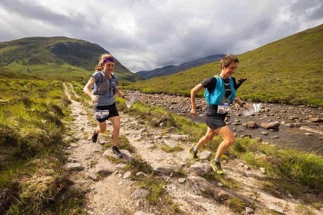 Cape Wrath Ultra 2021 - Lisa Watson (left and third overall) and Sally Fawcett (second overall) enjoyed racing each other - copyright No Limits Photography 118