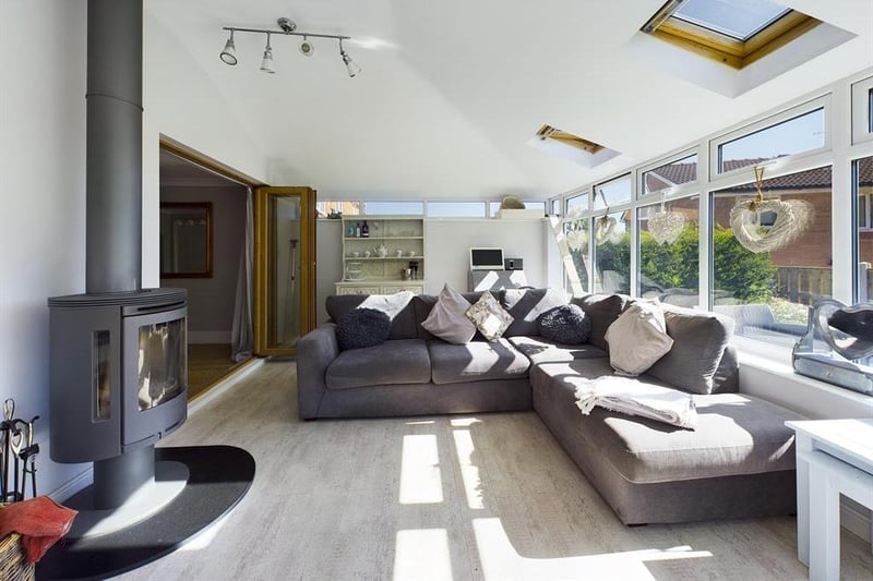 The property boasts a "beautiful and modern garden room".