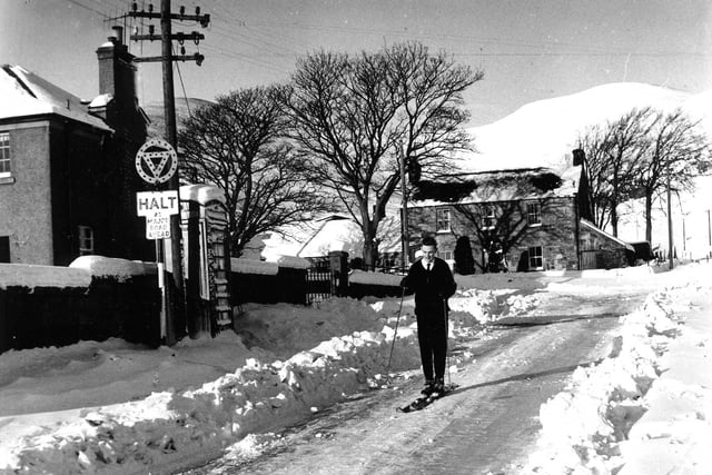 Due to the snow havoc in Scotland, F Walker of Silverburn had to use skis to get around. 11 November, 1962