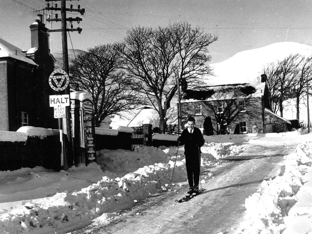 Due to the snow havoc in Scotland, F Walker of Silverburn had to use skis to get around. 11 November, 1962
