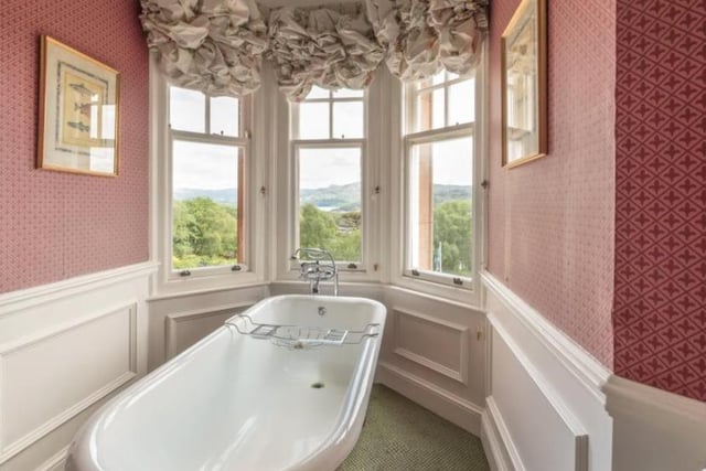 There are no shortages of bathrooms in the castle either, boasting wonderful standing bathtubs and views onto the expansive grounds