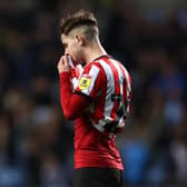 James McAtee of Sheffield United looks dejected following defeat at Coventry City: Darren Staples / Sportimage