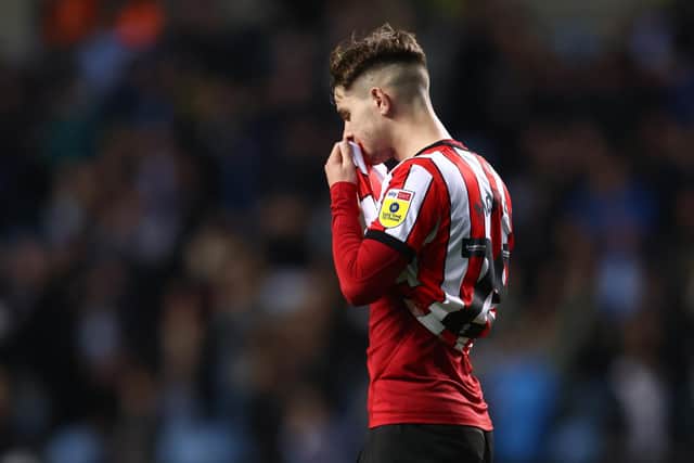 James McAtee of Sheffield United looks dejected following defeat at Coventry City: Darren Staples / Sportimage