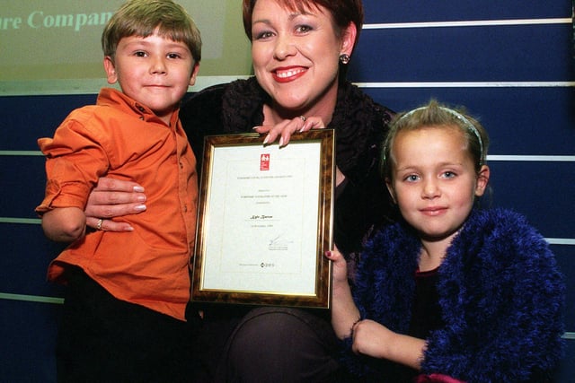 Yorkshire Youngster of the Year, Kyle Barton from Sheffield, receiving his award from TV news presenter Christa Ackroyd and 1998 winner India Farmer at the Yorkshire Young Achiever Awards