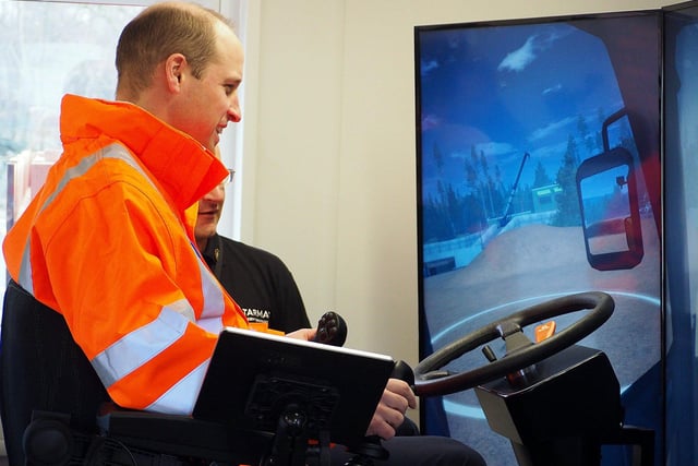 The Duke of Cambridge visits Tarmac's national skills and safety park to officially open the centre. The Duke of Cambridge Having ago on an excavator simulator.