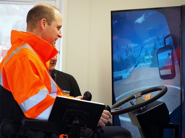 The Duke of Cambridge visits Tarmac's national skills and safety park to officially open the centre. The Duke of Cambridge Having ago on an excavator simulator.