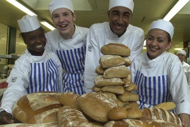 Castle college catering students Shespa Makumbe and Jordan Burford with some of the bread baked on their French Bread Day,the bread formed part of the harvest festival celebrations  at the Sheffield cathedral in 2002