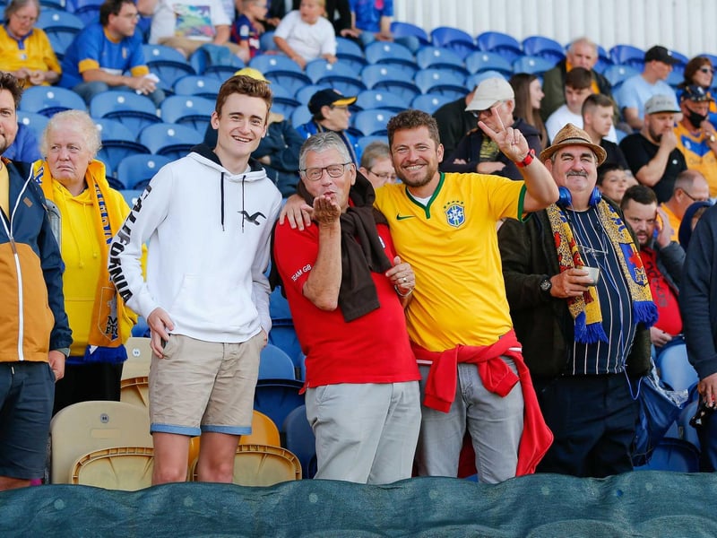 Mansfield Town fans in the stands ahead of their side's defeat to Preston North End.