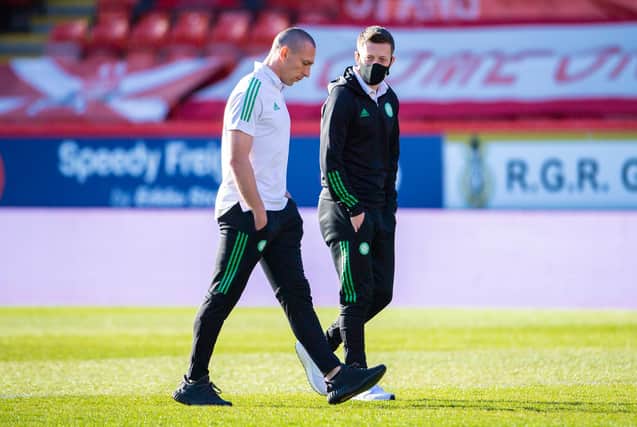 ABERDEEN, SCOTLAND - APRIL 21: Celtic captain Scott Brown (left) with Callum McGregor during a Scottish Premiership match between Aberdeen and Celtic at Pittodrie Stadium, on April 21, 2021, in Aberdeen, Scotland. (Photo by Paul Devlin / SNS Group)