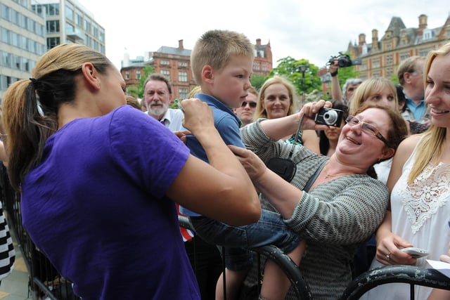 Jessica Ennis with a young fan a tthe send-off