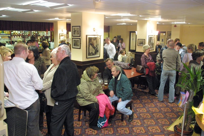 Theatre-goers enjoy a drink at the bar of Chesterfield's Pomegranate Theatre