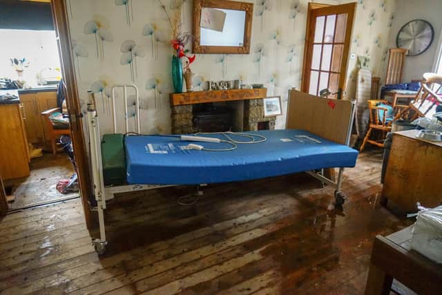 Medical bed inside Richard Eden's wrecked home