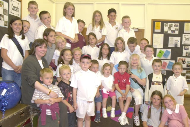 Head teacher Anne -Marie Morris (front left) pictured with some of the pupils from the Hazelbarrow School that has closed for the last time in 2003