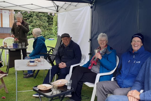 Rainy and cold Sunday did not deter residents from getting together to celebrate.