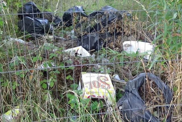 It was once the site of a makeshift shrine to the victim of a tragic South Yorkshire murder.  But now land behind Victoria Street, Dinnington, has been targeted by fly tippers who have been accused of failing to respect much-loved teenager Leonne Weeks, whose body was found there in 2017