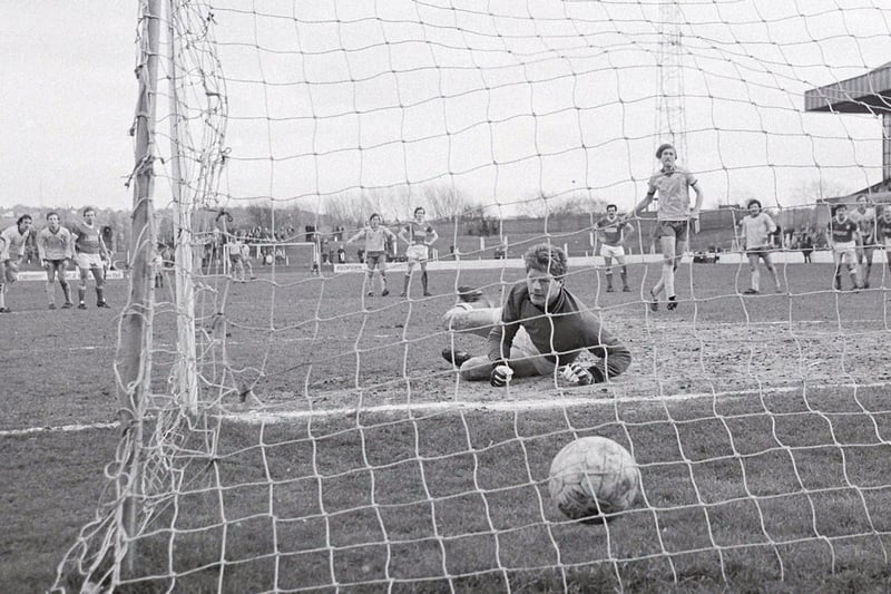 John Dungworth slots home the winning penalty at home to Swindon Town.