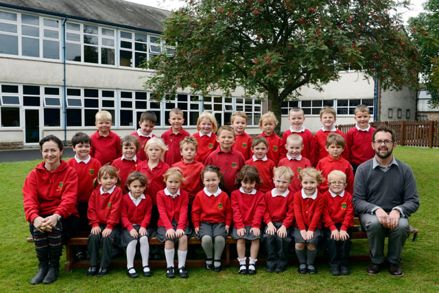 The new reception class pupils at Wooler First School with Madaline Fletcher and Peter Lindley.