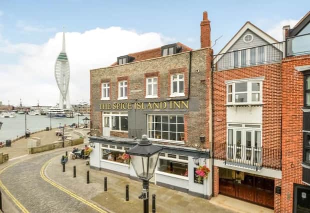 This townhouse in Bath Square, Old Portsmouth, has spectacular harbour views. It is on the market for £835,000.