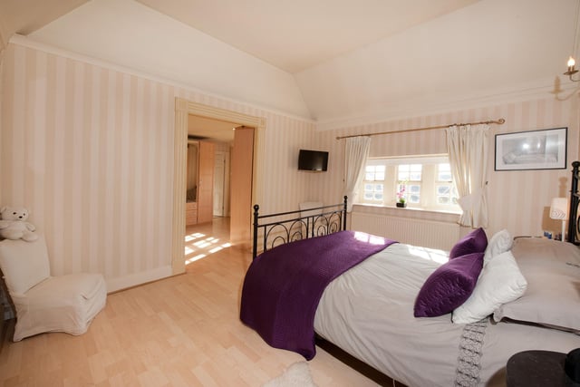 The master double bedroom has a dressing room and large en-suite bathroom.