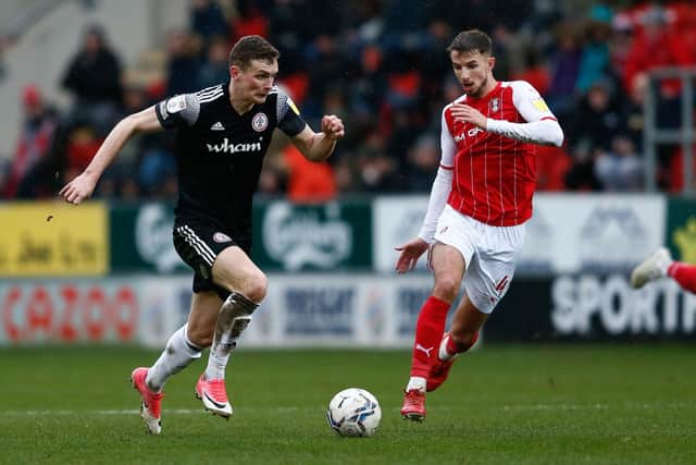 Accrington Stanley's Ethan Hamilton and Rotherham United's Daniel Barlaser in action during the Sky Bet League One match at AESSEAL New York Stadium, Rotherham: Will Matthews/PA Wire.