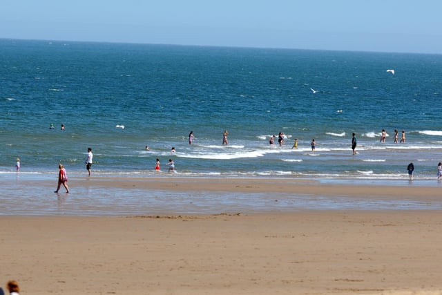 It was hot enough for people to enjoy a dip in the sea at Sandaven Beach.