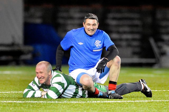 Broadwood Stadium Old Firm Legends charity football match in 2012. Chick Charnley and Charlie Miller have a bit of fun during the match.
