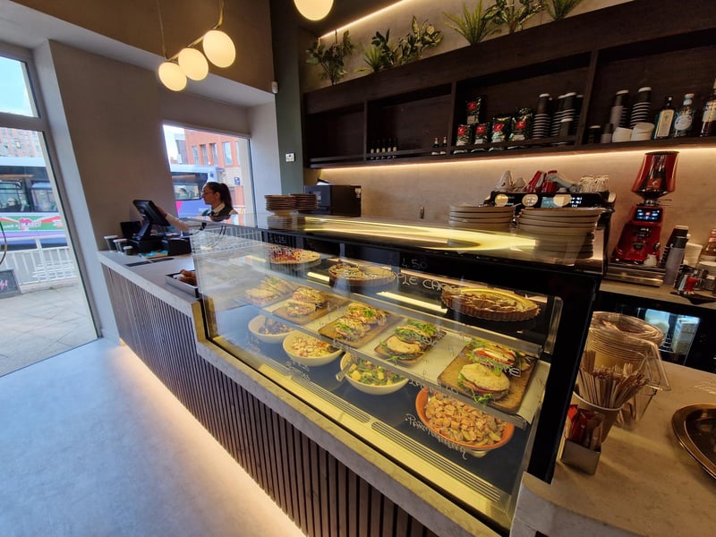The cafe's position, curving round between Church and Leopold streets, inspired the name which translates as 'corner shop' Vito said.