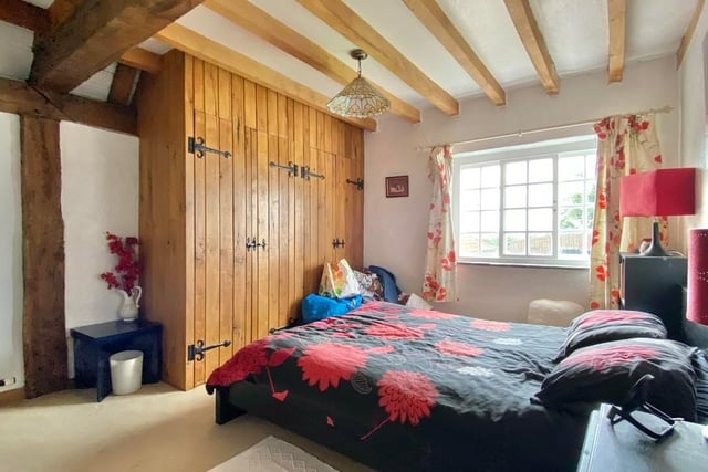 The fourth bedroom includes a window to the back of the property, giving wonderful views over open countryside. The large fitted wardrobes come in handy too.