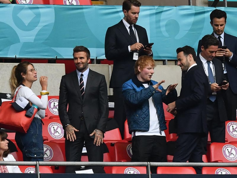 Even David Beckham (L) and singer Ed Sheeran (R) made an appearance in the stands to cheer on the home nation (Pool/AFP/Getty Images)