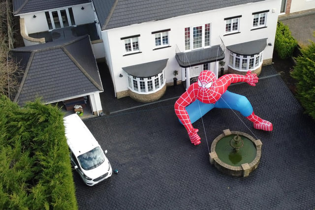 Ray Liddell blew up this huge Spiderman inflatable after previously raising thousands of pounds for Alice House Hospice with a giant Grinch. Picture: Michael Wilkinson Photography.