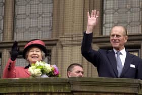 HRH Her Majesty the Queen and the Duke of Edinburgh wave to the crowds of on-lookers from Sheffield Town Hall Balcony (May 22, 2003)