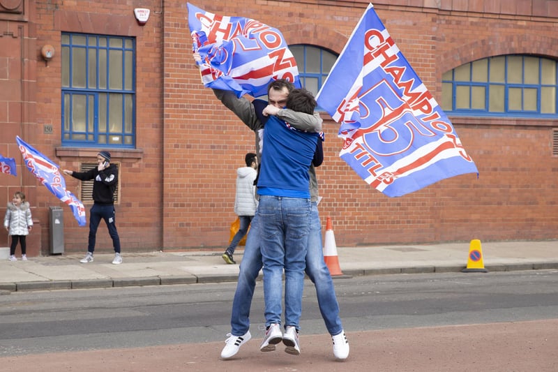 Rangers fans gather outside Ibrox as they are crowned champions on March 07, 2021, in Glasgow, Scotland.