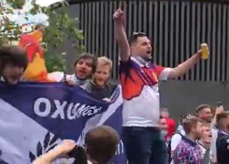 A screen grab from footage taken with permission from the Twitter feed of @SimonLamrock of Scotland fans singing 'Yes sir I can boogie' outside King's Cross St Pancras station, as fans arrive from Scotland for the fixture against England.