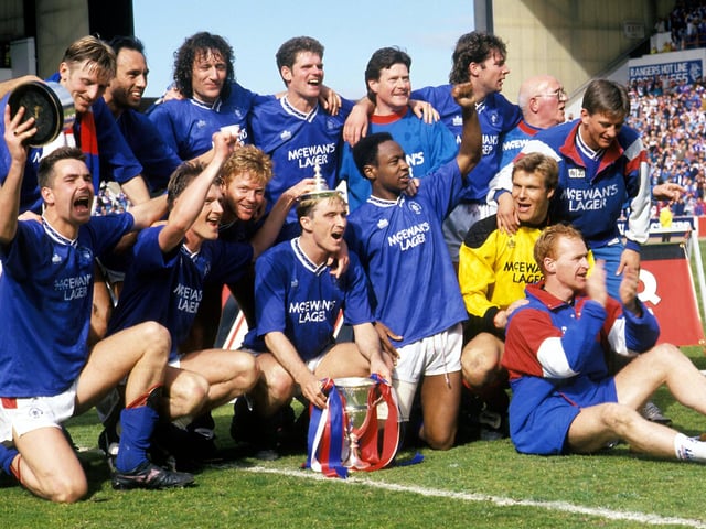 Still in interim charge, Smith guides Rangers to a final-day victory over leaders Aberdeen, claiming the Scottish Premier Division crown. He's given a permanent deal shortly after.