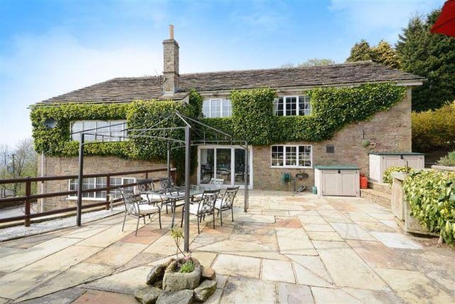 The five bedroom house is situated in an elevated position on a quiet country lane with outstanding views from both the house and the gardens.