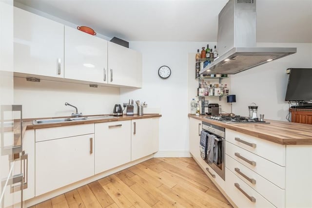 The modern fitted kitchen has been well equipped with ample worktop surface, gas hob, integrated fridge freezer, washing machine and dishwasher.