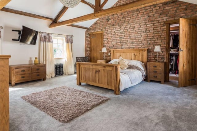 There are five bedrooms in total, including a beautifully furnished master room with an en-suite bathroom, and his and hers dressing rooms.