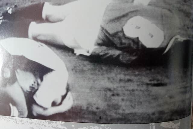 John Buckley lies prostrate after his sickening clash of heads with Gary Poole in March 1993.