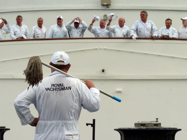 50 of Britannia's former Royal Yachtsmen stepped back on board this week for a special reunion, coinciding with the 56th anniversary of the Yacht's launch from Clydebank. The yachtsmen donned their overalls and picked up their tools to help with the ship's maintenance.  21st April 2009. Picture by JANE BARLOW