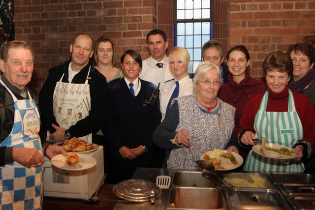 Volunteers serving Christmas dinners at St.Augustines Church, Staveley, in 2007.