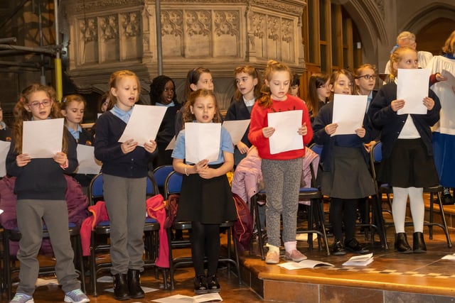 Locals gathered on Sunday afternoon at St Marys Church to take part in The News' Christmas Carol Service & Christingle, with readings from The News' Editor Mark Waldron and Pompey Manager Danny Cowley, along with Carols from local school children. Photos by Alex Shute