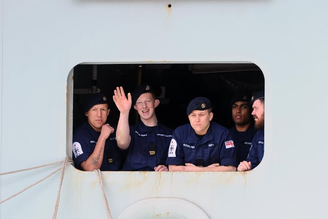 Sailors on HMS Queen Elizabeth as she returns to Portsmouth. Picture: (020720-5215)