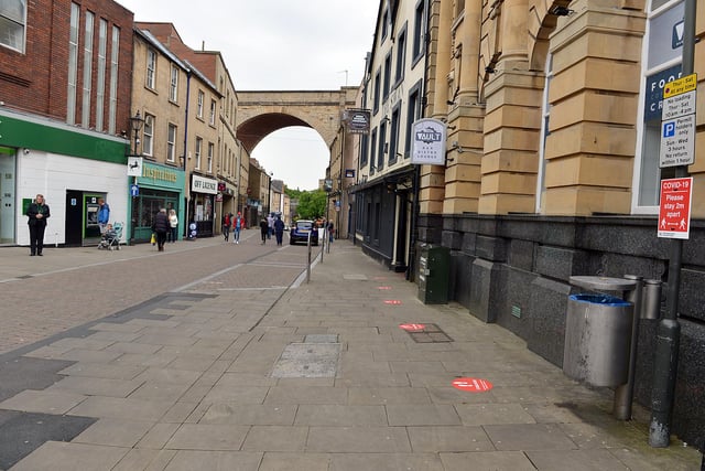 Mansfield Town centre 10 weeks into lockdown. Signs going up in preparation for more lockdown easing on Monday June 15th.