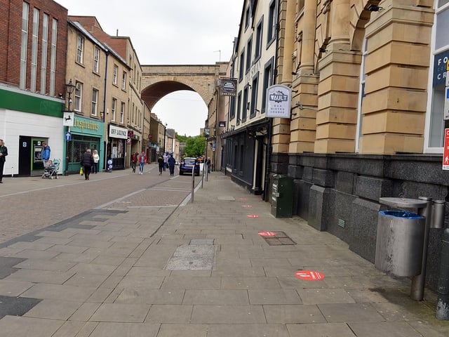Mansfield Town centre 10 weeks into lockdown. Signs going up in preparation for more lockdown easing on Monday June 15th.
