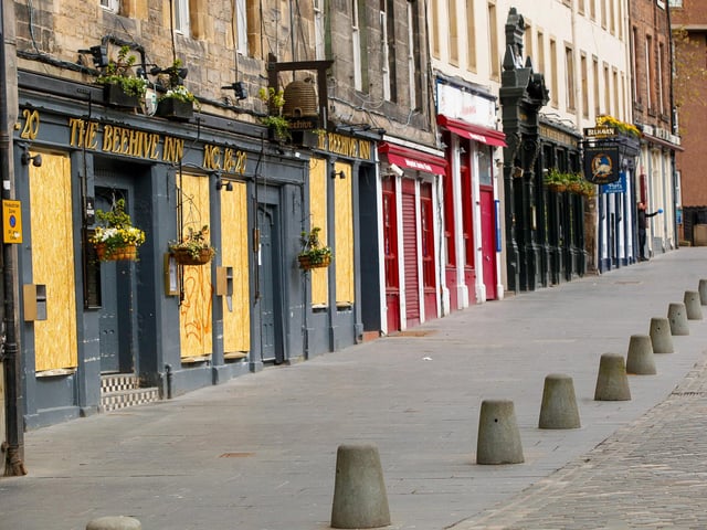 Bars along the Grassmarket are boarded up, and customers have stayed at home.