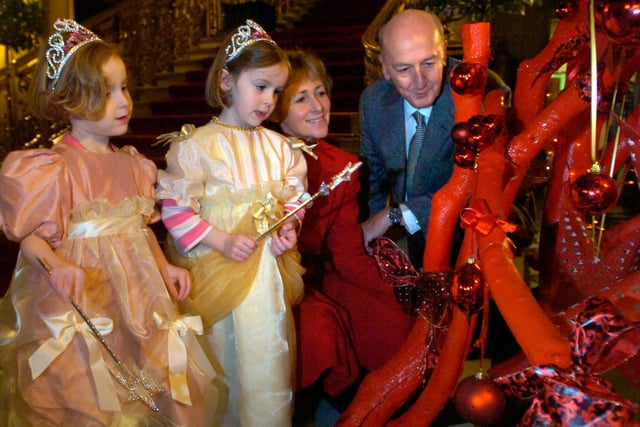 The Duke and Duchess with Lily and Lottie Doxey in 2009